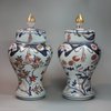 Y89 Pair of Japanese imari baluster vases and covers, circa 1700