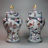 Y89 Pair of Japanese imari baluster vases and covers, circa 1700