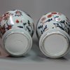 Y89 Pair of Japanese imari baluster vases and covers, circa 1700