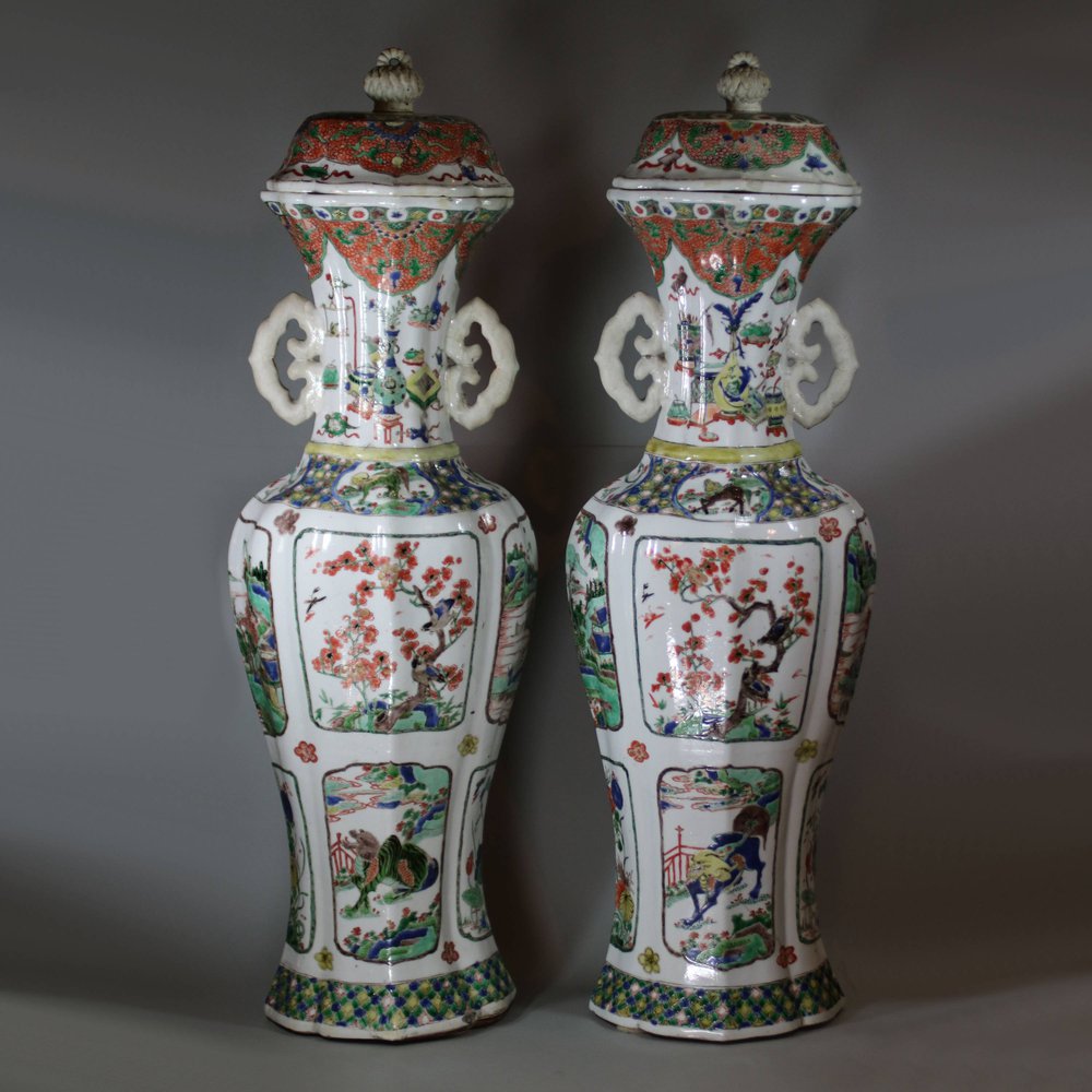 Y906 A pair of large famille verte lobed baluster vases and covers