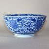 W916 A FINE BLUE AND WHITE 'LOTUS' BOWL KANGXI SIX-CHARACTER MARK AND OF THE PERIOD (1662-1722)